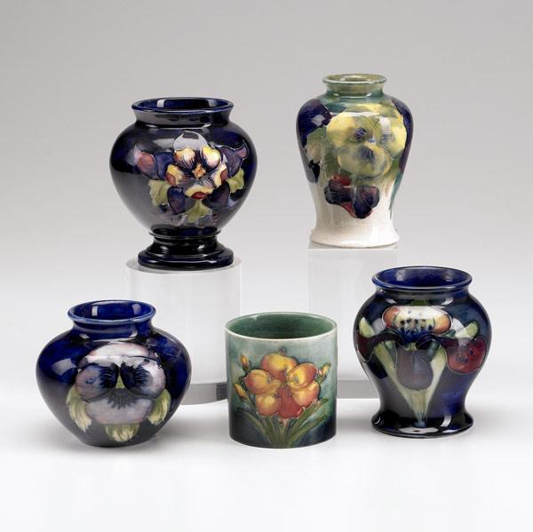 Appraisal: MOORCROFT Five cabinet vases two in the Pansy pattern one