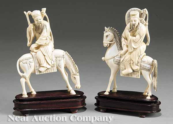 Appraisal: Two Chinese Carved Ivory Figures of Immortals the first a