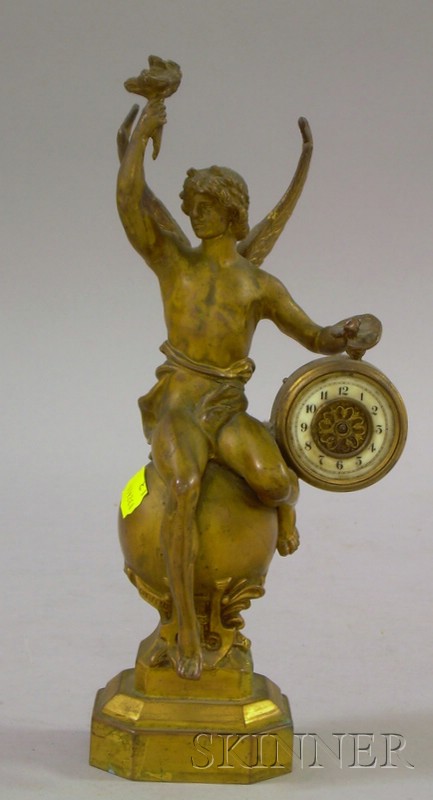 Appraisal: Figural Mantel Clock by Waterbury Clock Company Waterbury Connecticut the