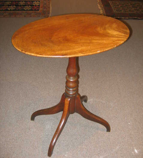 Appraisal: ENGLISH TH CENTURY MAHOGANY CANDLESTAND The oval top rests on