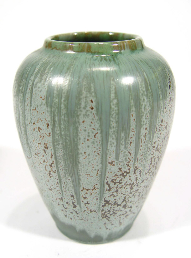 Appraisal: English Art pottery vase decorated with a green crystaline glaze