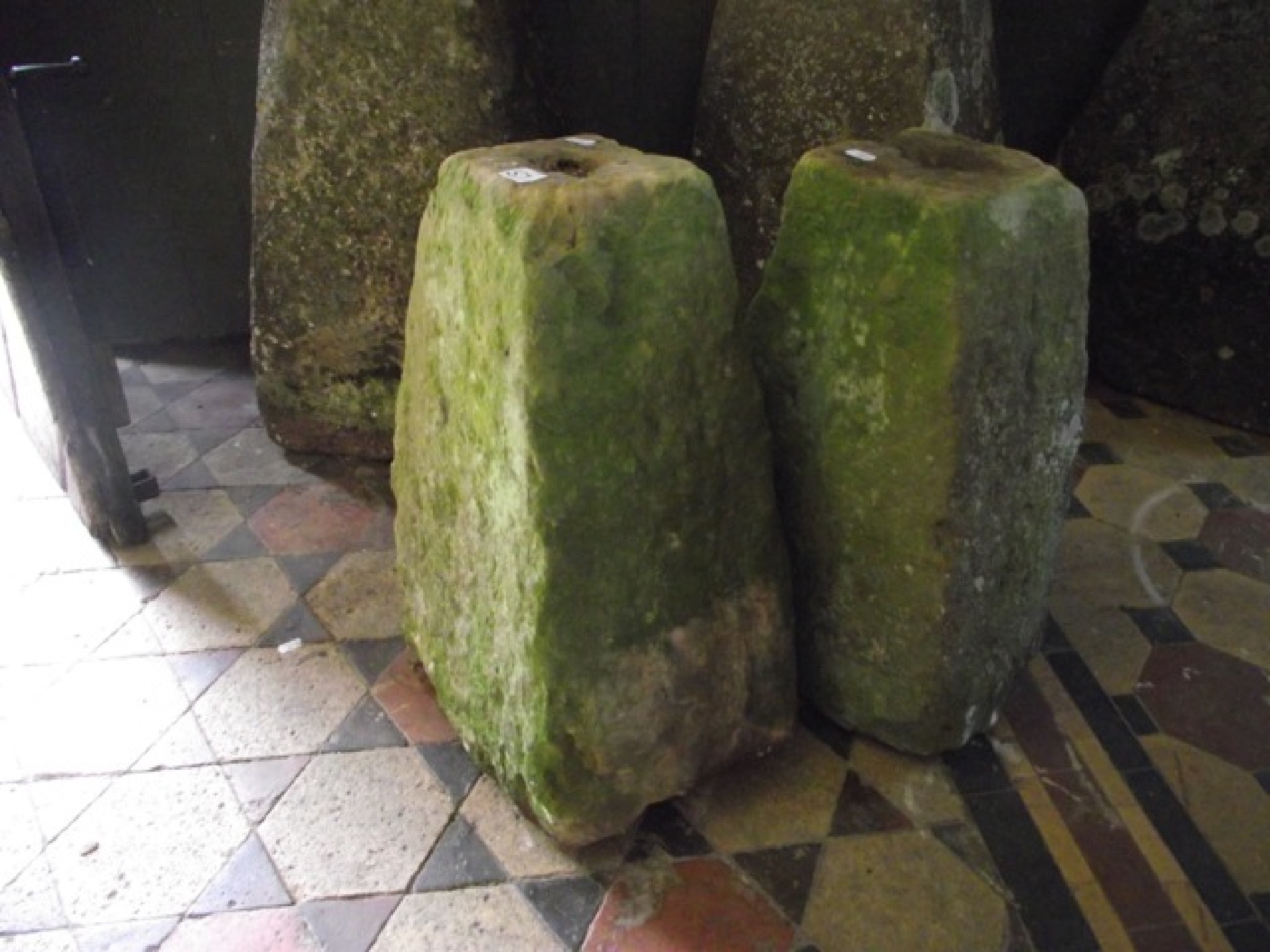 Appraisal: Two small weathered natural stone staddle stone bases of square