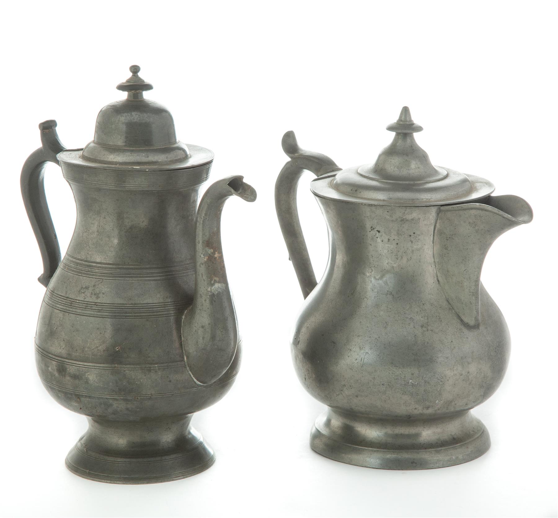 Appraisal: TWO PEWTER TEAPOTS American nd half th century Homan baluster