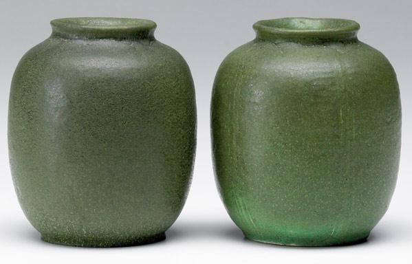 Appraisal: GRUEBY Two cabinet vases in matte green glaze Stamped one