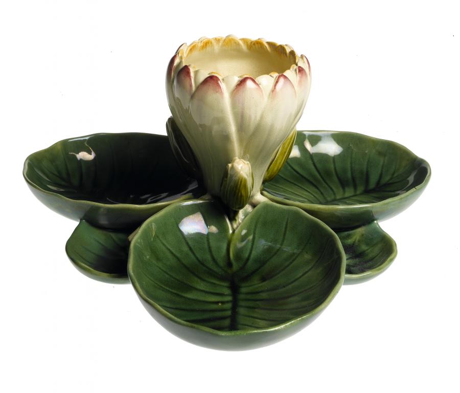 Appraisal: A MINTONS MAJOLICA WATERLILY CENTREPIECE with central flower and six