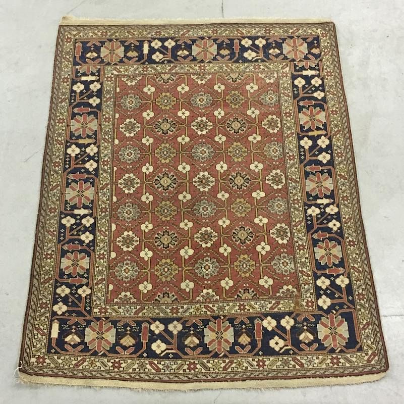 Appraisal: Caucasian Mat with Red Field and Floral Rosettes Caucasian mat