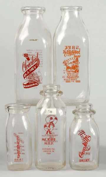 Appraisal: Lot of Milk Bottles Description Includes two one-quart size two