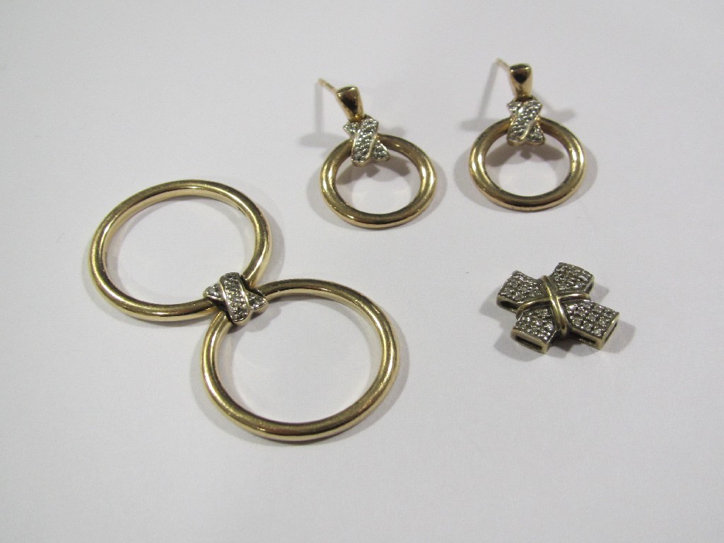 Appraisal: Nine carat gold diamond set ring with matching earrings and