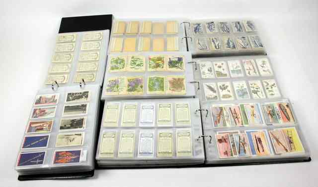 Appraisal: A large quantity of cigarette cards including Players Wills Godfrey