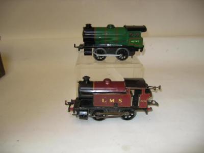 Appraisal: A Hornby Type clockwork locomotive in L M S red