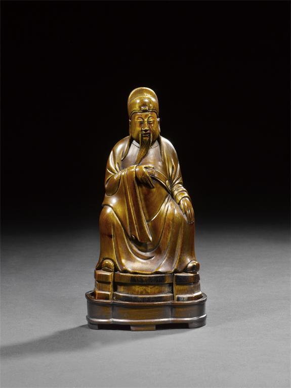 Appraisal: A good Chinese stained ivory figure of a magistrate