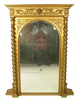 Appraisal: A mid th century Italian giltwood and gesso wall mirror