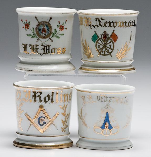 Appraisal: FOUR FRATERNAL SHAVING MUGS porcelain with polychrome painted fraternal symbols