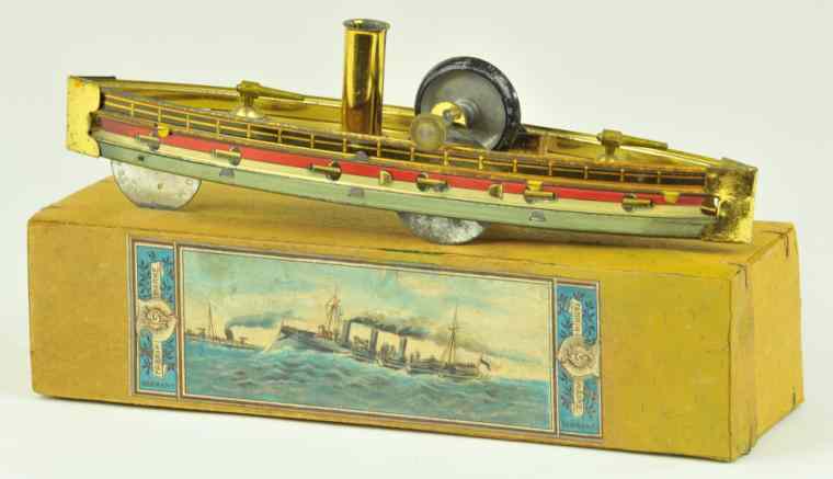 Appraisal: HESS GUNBOAT WITH BOX Germany lithographed tin flywheel appears on