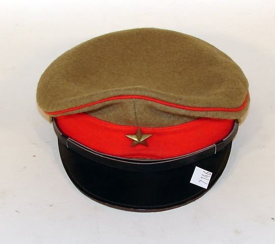 Appraisal: WWII Japanese-style enlisted visor hat Complete with brass star insignia