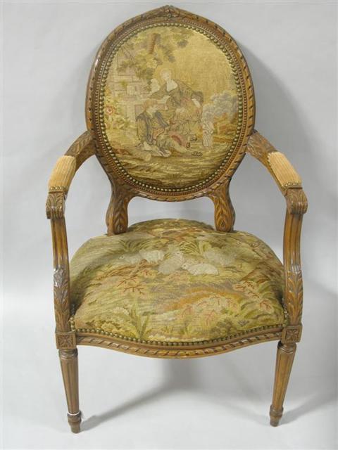 Appraisal: LOUIS XVI STYLE MAHOGANY NEEDLEPOINT FAUTEUIL The shaped frame with