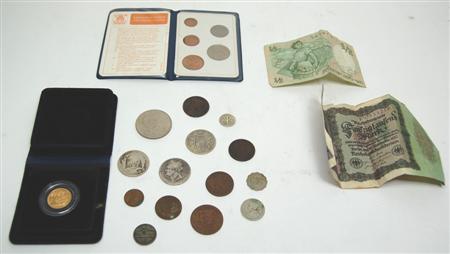 Appraisal: A collection of coins including a sovereign maundy set EF