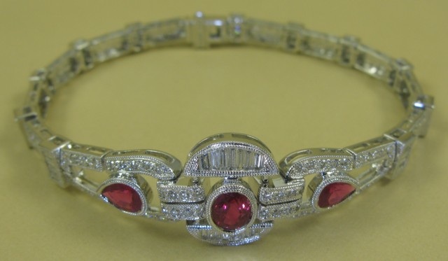 Appraisal: ART DECO STYLE RUBY DIAMOND AND EIGHTEEN KARAT WHITE GOLD