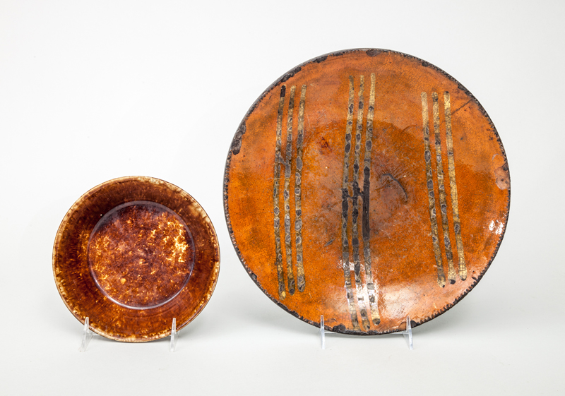 Appraisal: REDWARE POTTERY PLATE AND ROCKINGHAM-GLAZED POTTERY BOWL in x and