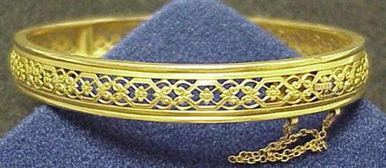 Appraisal: JEWELRY K yellow gold filigree bangle bracelet mm wide weighing