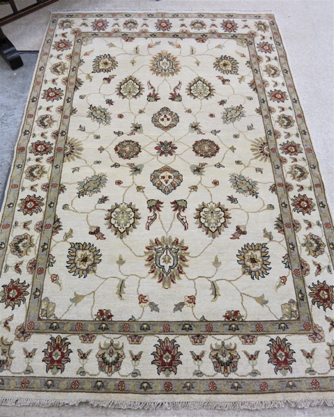 Appraisal: HAND KNOTTED ORIENTAL CARPET Persian Isfahan design of floral tracery