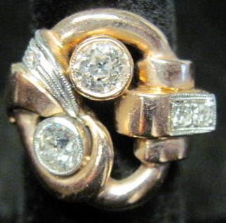 Appraisal: Platinum and diamond ringSet with five round cut diamonds two