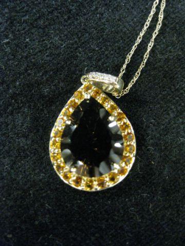 Appraisal: Smokey Quartz Citrine Pendant pear shaped gem surrounded by vivid