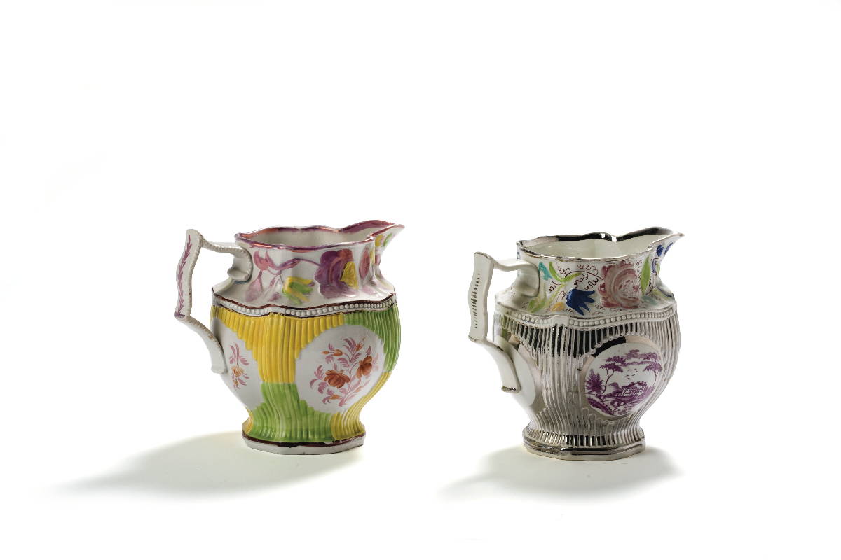 Appraisal: TWO STAFFORDSHIRE SILVER AND PINK LUSTRE ENAMEL-DECORATED AND TRANSFER-PRINTED JUGS