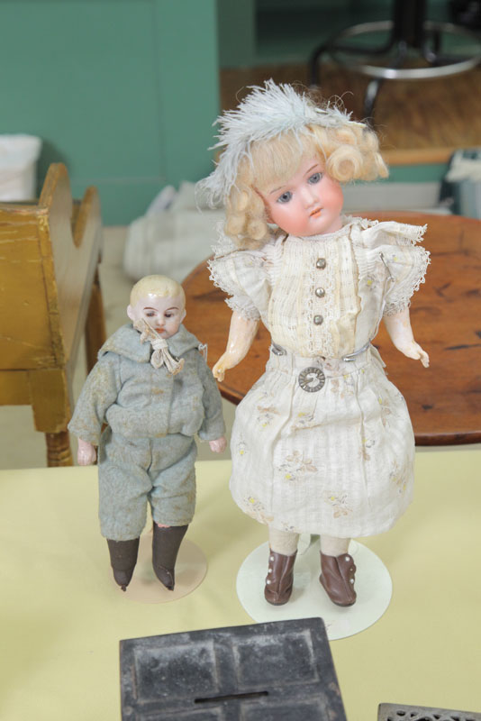 Appraisal: TWO DOLLS Bisque head A M Floradora ''h Small boy