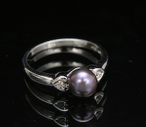 Appraisal: A Pretty Black Pearl And Diamond Ladies' Ring A pretty