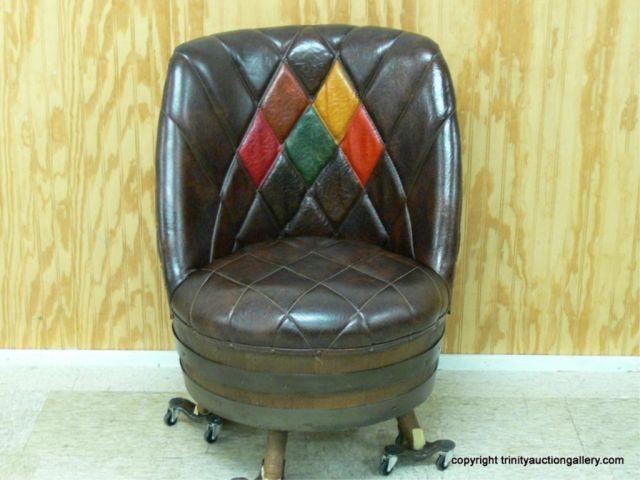 Appraisal: Whiskey Barrel Swivel Chair - Naugahyde - Matches the sofa