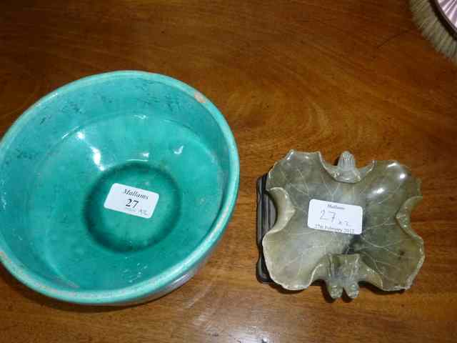 Appraisal: AN ORIENTAL JADE DISH in the form of a lotus