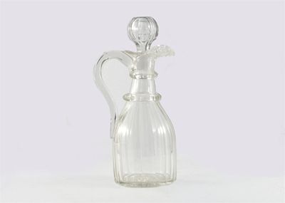 Appraisal: A cut glass claret jug and spherical stopper with two