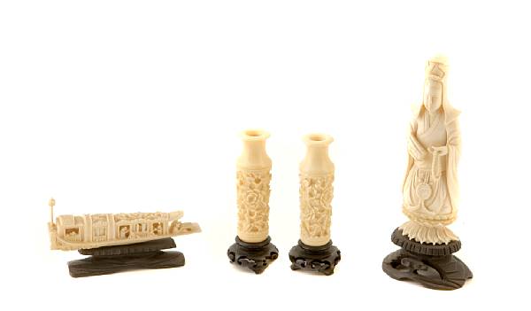 Appraisal: A group of four ivory carvings comprising a Guanyin a