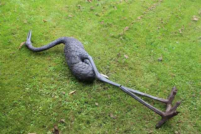 Appraisal: A BRONZE SCULPTURE of a standing stork approximately high one