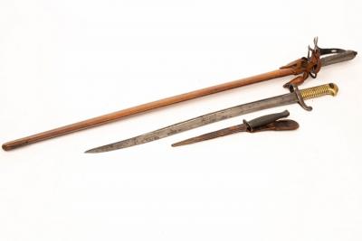 Appraisal: A th th Century artillery officers' sword with leather scabbard