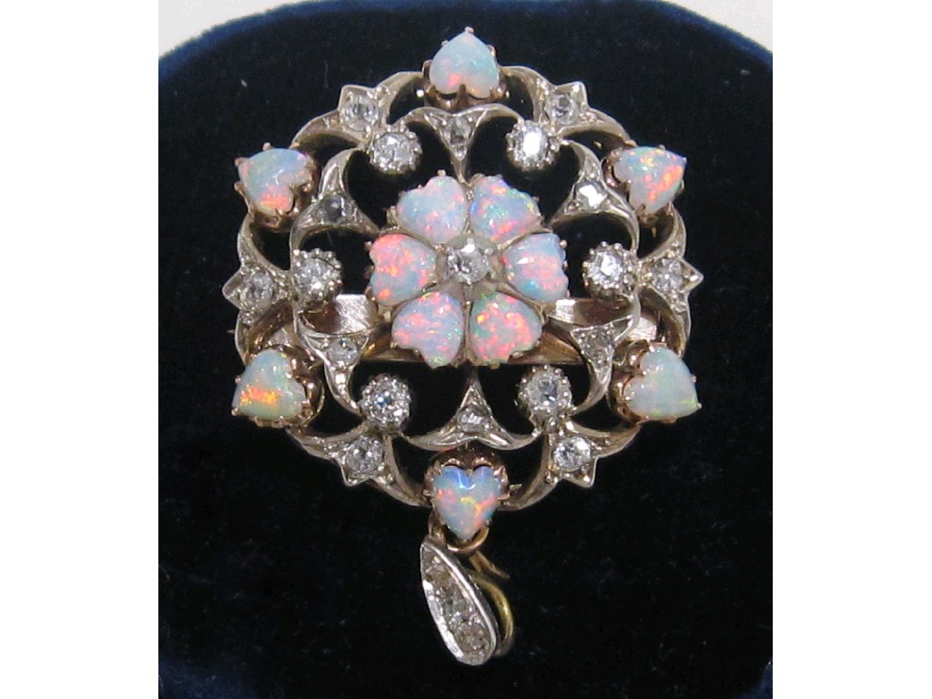 Appraisal: Edwardian bi colour gold opal and diamond set pendant brooch