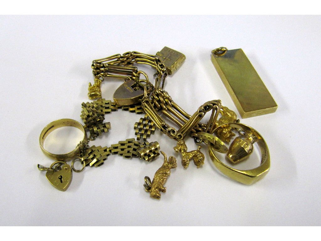 Appraisal: Lot of ct gold comprising rings ingot gate bracelet charms