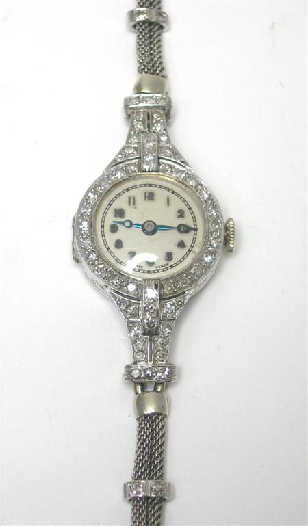 Appraisal: A 's platinum and diamond cocktail watch the champagne coloured