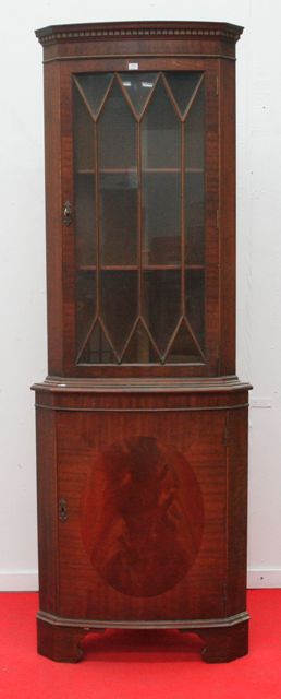 Appraisal: A th Century mahogany veneered corner cabinet cms wide x