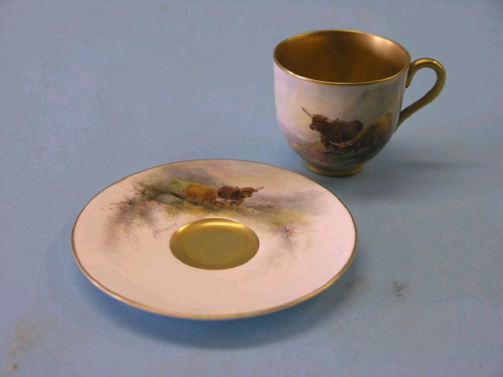 Appraisal: A Royal Worcester cabinet cup and saucer painted by Harry