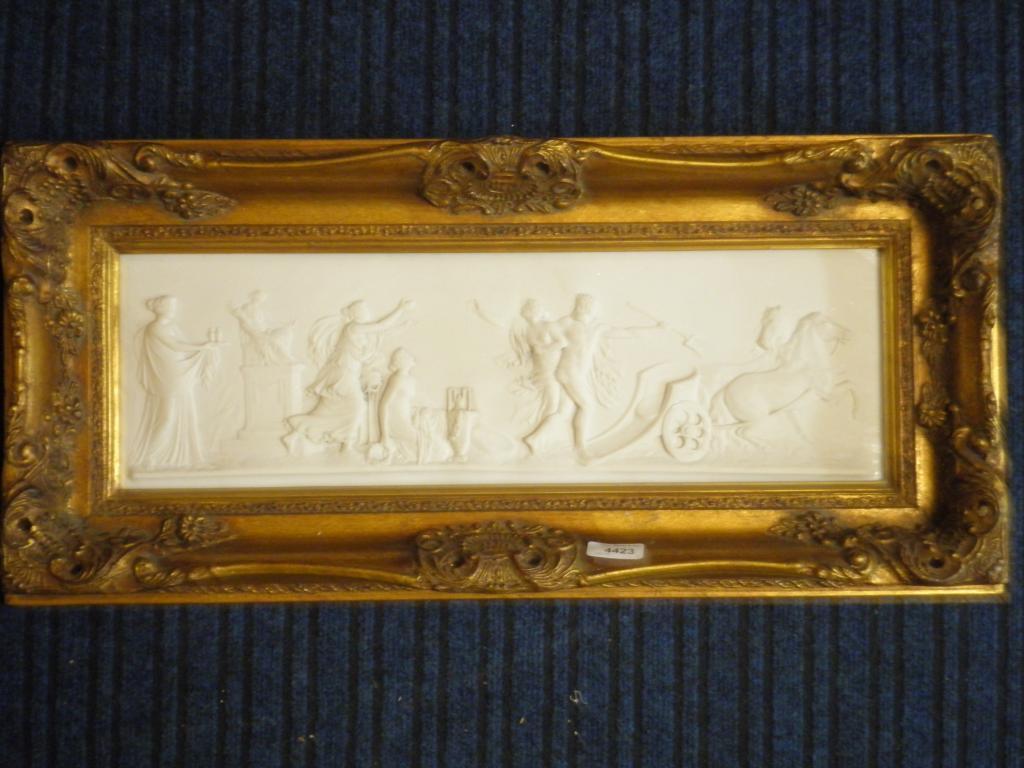 Appraisal: An ornate gilt framed composition plaque Classical Figures and Charriot