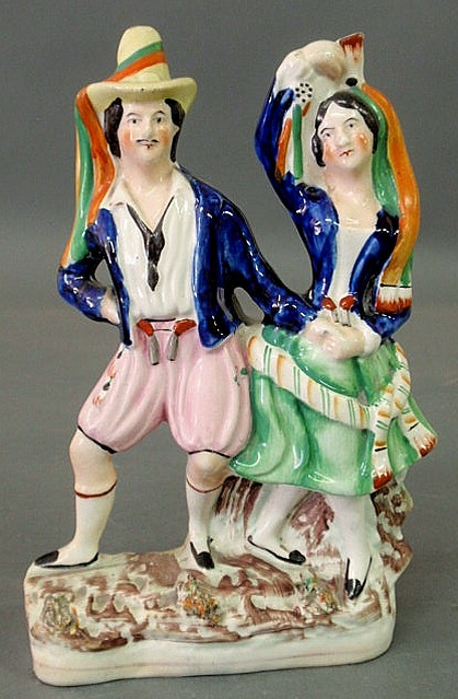 Appraisal: Staffordshire figural group of Diavolino and Catrina h x w