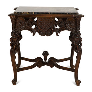 Appraisal: An Italian Rococo Style Carved Black Walnut Marble Top Side