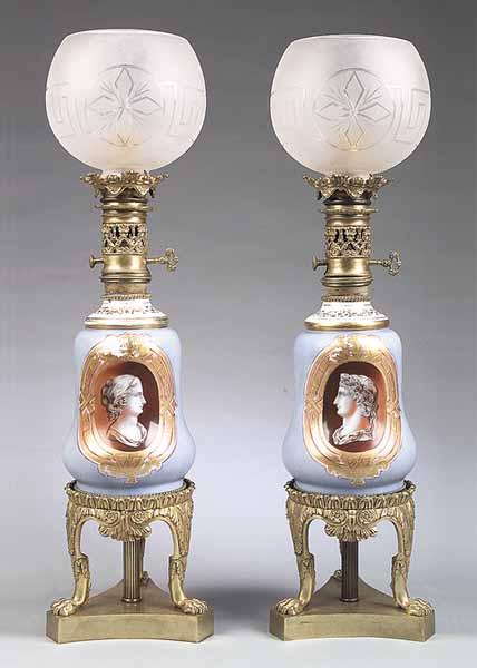 Appraisal: A Pair of Antique French Porcelain Carcel Lamps having powder