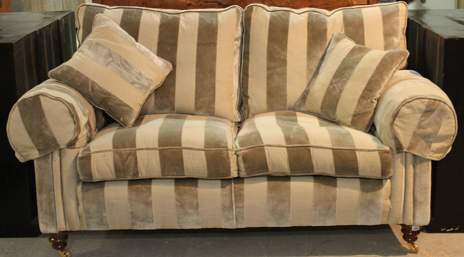 Appraisal: A th century sofa with two tone stripe upholstery on