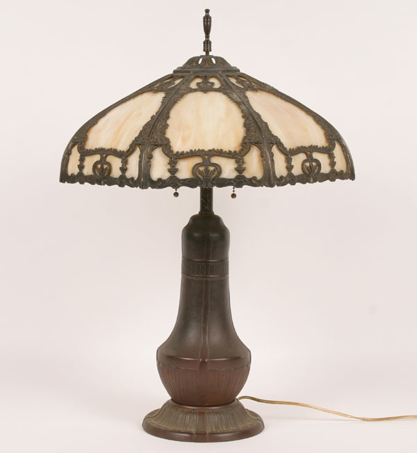 Appraisal: Cast caramel slag eight panel lamp with molded floral and