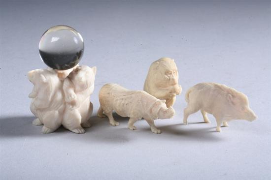 Appraisal: FOUR JAPANESE IVORY OKIMONO Three bears with crystal ball monkey