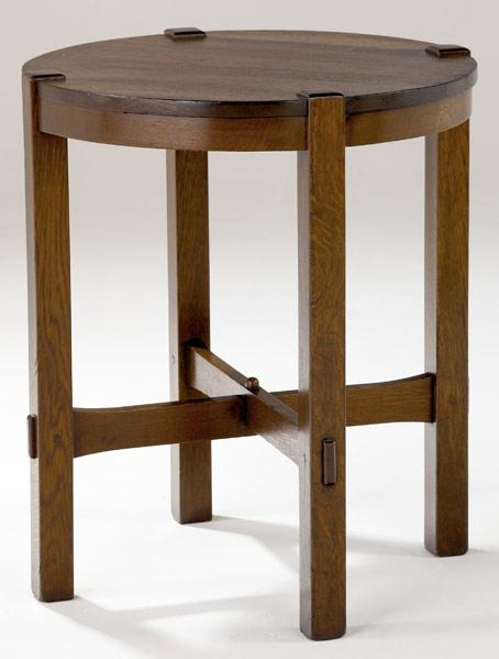 Appraisal: GUSTAV STICKLEY Lamp table no with legs mortised through its