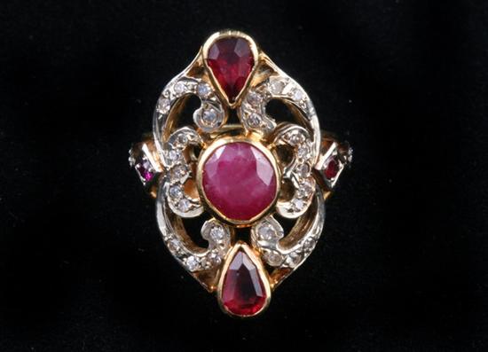 Appraisal: K YELLOW AND WHITE GOLD RUBY AND DIAMOND RING Round